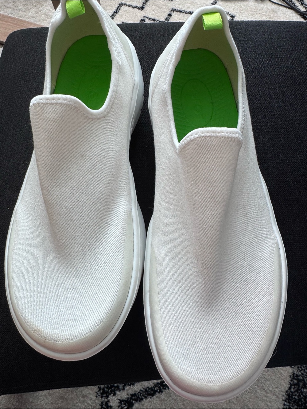 OOFOS Women's White Slip-On Flats with Lime Green Insole